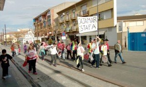 stop desahucios en la entrada a Armilla. Marcha a Almería